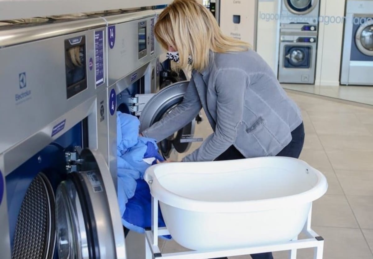 Women putting laundry