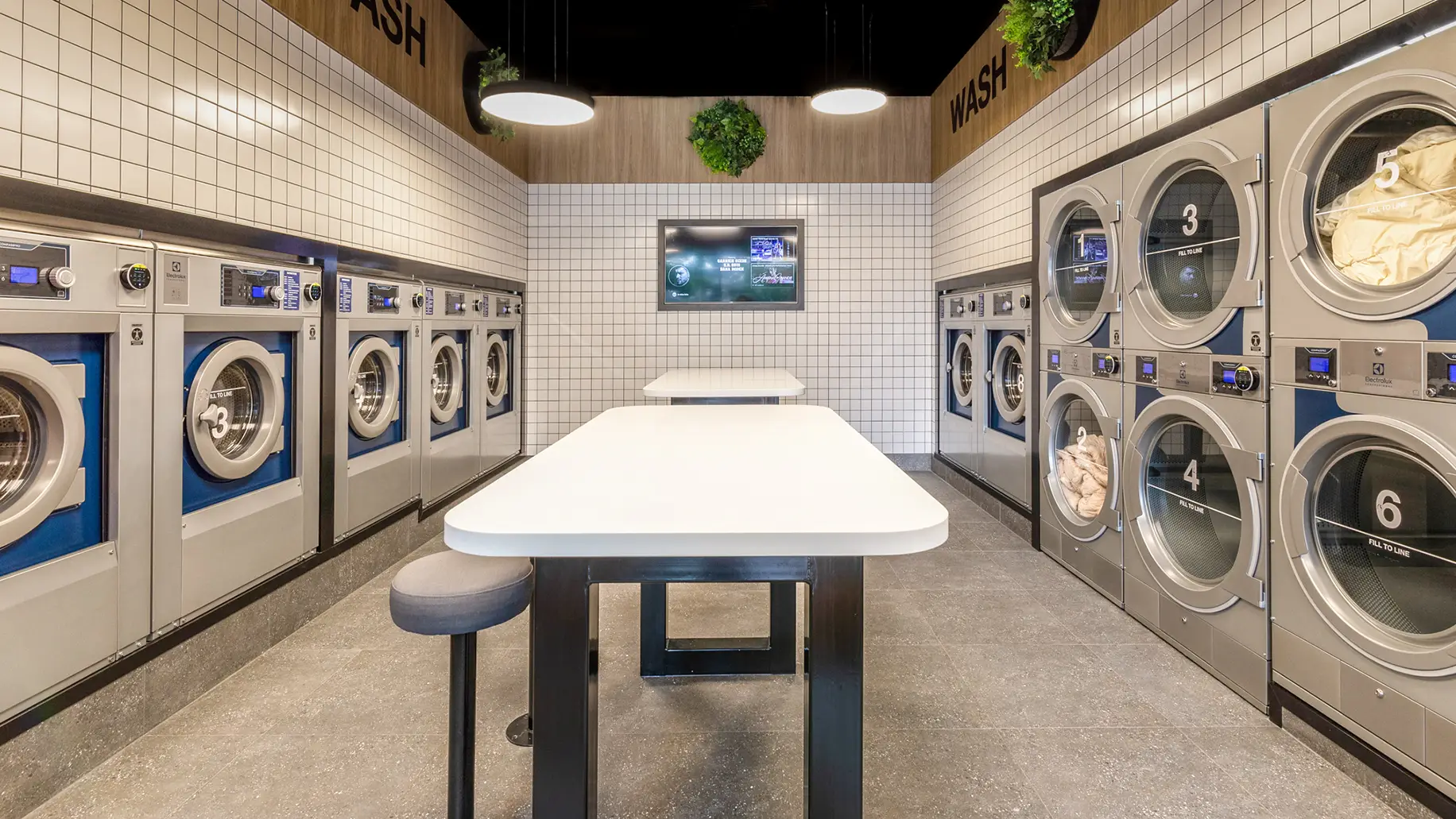 folding tables inside laundromat